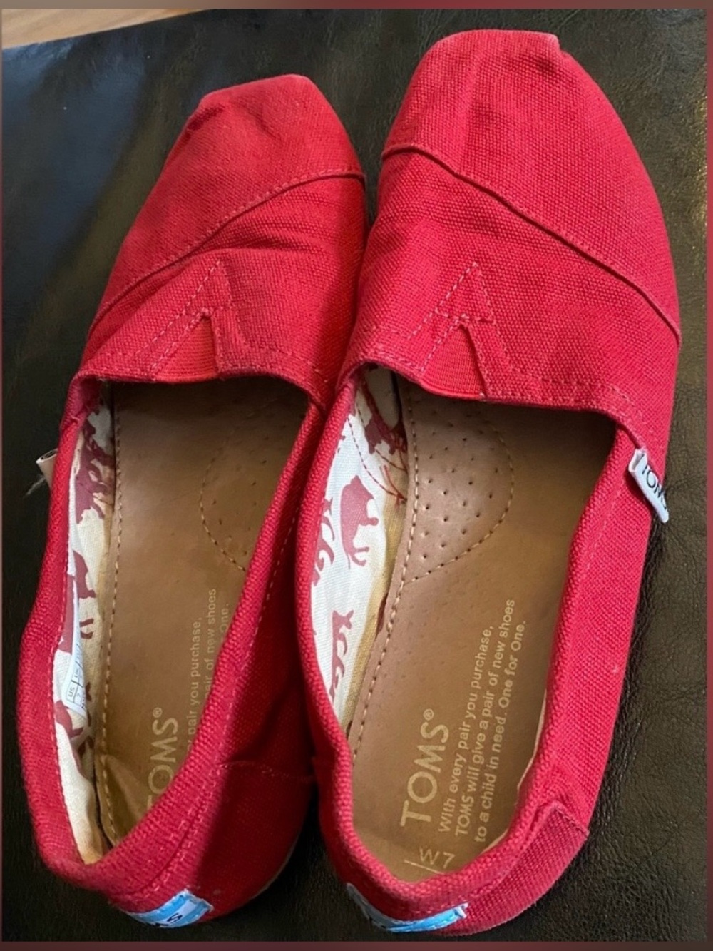 Woman’s Red Toms Size 7